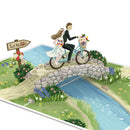 Newlyweds on bicycle Pop-Up Card