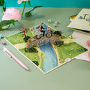 Newlyweds on bicycle Pop-Up Card