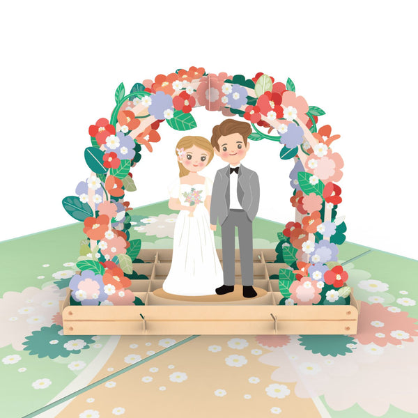Newlyweds under floral arch Pop-Up Card